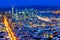 Night pnoramic view of San Francisco downtown with skyscrapers and Okeland Bridge