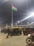 A night in the railway station. Crowd for Indian flag