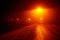 Night road lit by streetlamps