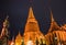 Night Scene of The Emerald Buddha Temple or Wat Phra Kaew with Pagodas from the Grand Palace View, Bangkok, capital of Thailand.