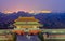 Night scene of the Forbidden City in the fog