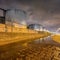 Night scene with large silo at petrochemical production plant, Port of Antwerp