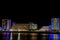 Night scene. Multi-colored lights of 4 stars Berlin Golden Beach hotel buildings on Black Sea coast