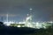 Night scene of Petronor petrochemical plant.