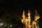 Night scene Thai Giant guardian at front entrance of the `Ordination Hall` in Wat Arun Ratchawararam.