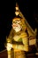 Night scene Thai Giant guardian at front entrance of the `Ordination Hall` in Wat Arun Ratchawararam is the most famous Buddhist t