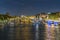 Night Scene of Tourists Cruises Over Seine River With Parisians Architecture