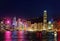 Night scenery of Hong Kong with a majestic skyline of crowded skyscrapers by Victoria Harbour