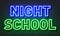 Night school neon sign on brick wall background.