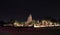 Night shot of the Main Phra Prang in corn shape and small stupa around the main in the ruins of ancient remains.