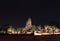 Night shot of the Main Phra Prang in corn shape and small stupa around the main in the ruins of ancient remains at Wat Phra Ram.