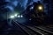 night shot of a steam train illuminated on railway tracks