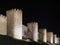 Night shot of the town wall of Avila, Spain