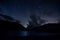 Night sky with clouds above lake in albanian nature near Fushe Stude, Albania