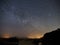 Night sky and milky way stars, Cygnus constellation over sea