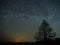 Night sky and milky way stars, meteor Cassiopeia and Cygnus constellation over swamp