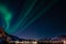 Night Sky with Northern Lights (Aurora) over Norwegian Fjords in