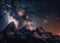 Night sky rising up over the Grand Tetons in Wyoming