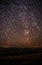 night sky, spiral star trails and the forest