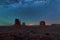 Night sky with stars above Monument Valley