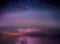 Night  starry sky  and moon at sea lilac blue nebula cosmic milky way  seascape