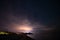 Night starry sky at the sea coast in Cirali, Turkey - landscape exterior.