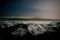 Night stars Ice rock with black sand beach at Jokulsarlon beach Diamond beach in southeast Iceland