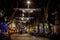 Night streets of Amsterdam with blurred silhouettes of passersby
