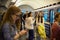 Night subway train. Young people on their way home after a late city holiday. Facial fatigue after prolonged amusement and