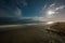 Night summer sand beach with full moon. Seascape