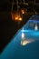 Night swimming pool and candles