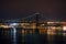 Night. Tejo river. 25th April bridge. Lisbon. Almada. Portugal. Nightscene. lights  colors dark background. landscape