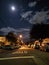 Night time city of Los Angeles captured under the light of a full moon.