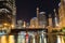 Night time exterior establishing shot overlooking Chicago river