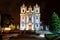 Night time, illuminated facade of Porto Portugal\'s tiled Romanesque Catholic Cathedral