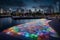 A night-time image of a mosaic podium on a waterfront promenade,