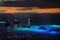 Night time manta ray snorkel and dive tour boats off the Kona Coast in Hawaii.