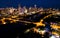 Night time nightscape aeral drone view above Austin Texas Skyline Cityscape illuminated city lights