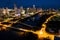 Night time nightscape aeral drone view above Austin Texas Skyline Cityscape illuminated city lights