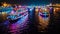 night time river cruise with boats adorned with dazzling lights for New Year