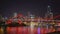 Night time shot of the story bridge and ferry in brisbane