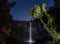 Night time water fall with stars