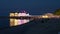 NIght TImelapse Of Sellin Pier Lit With Colorful Illumination During Concert, Silhouette of People