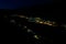 Night top view from Mount Vrmac to illuminated Bay of Kotor Boka Kotorska. Adriatic Sea. Dalmatia. Balkan. Montenegro