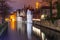 Night tower Belfort and the Green canal in Brug