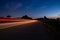 night track with blurred lights from the headlights of cars.long exposure time.