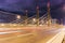 Night traffic bridge long exposure of car line lights transport
