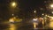 Night traffic on the city highway during a heavy downpour