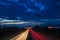 Night traffic scene with light trails on highway long exposure