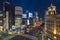 Night upper view of the clock tower of Ginza Wako building and the tower of sanai dream center.